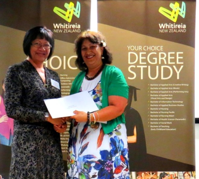 Compass Health presenting Caroline Komene with her scholarship award